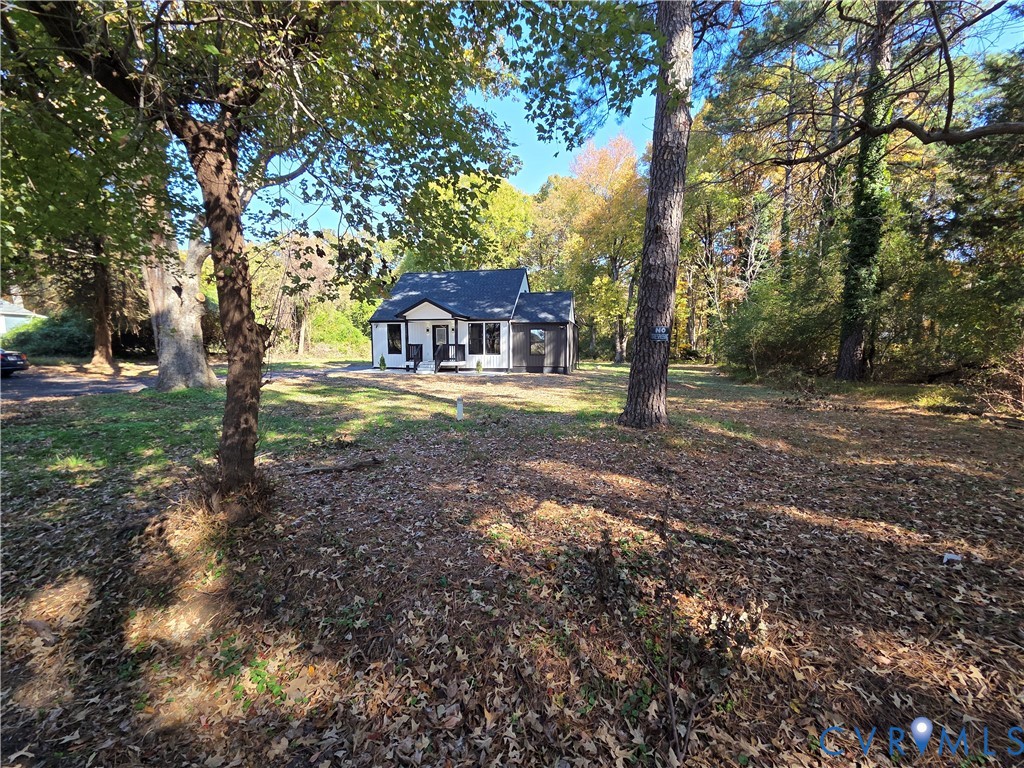 2420 Yarnell Road Henrico, VA 23231 - Photo 5 of 25 a dirt road with large trees