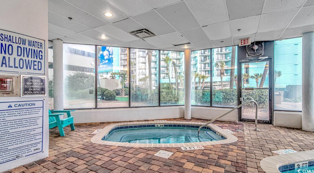 1605 South Ocean Boulevard, Unit 603 Myrtle Beach, SC 29577 - Photo 34 of 40 View of swimming pool with a hot tub