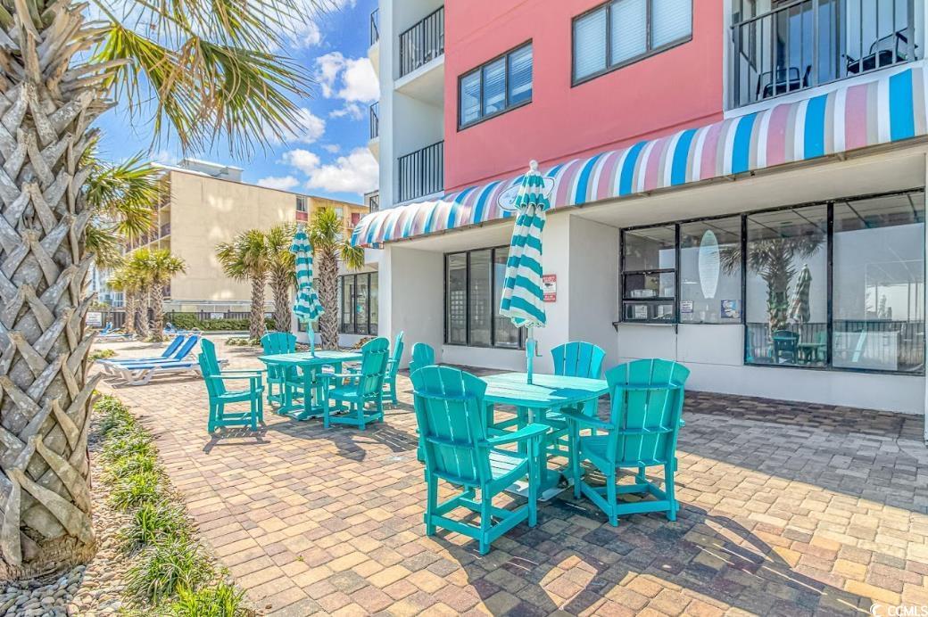 1605 South Ocean Boulevard, Unit 603 Myrtle Beach, SC 29577 - Photo 35 of 40 View of patio featuring outdoor dining space