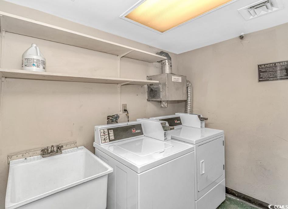 1605 South Ocean Boulevard, Unit 603 Myrtle Beach, SC 29577 - Photo 36 of 40 Shared laundry featuring independent washer and dryer