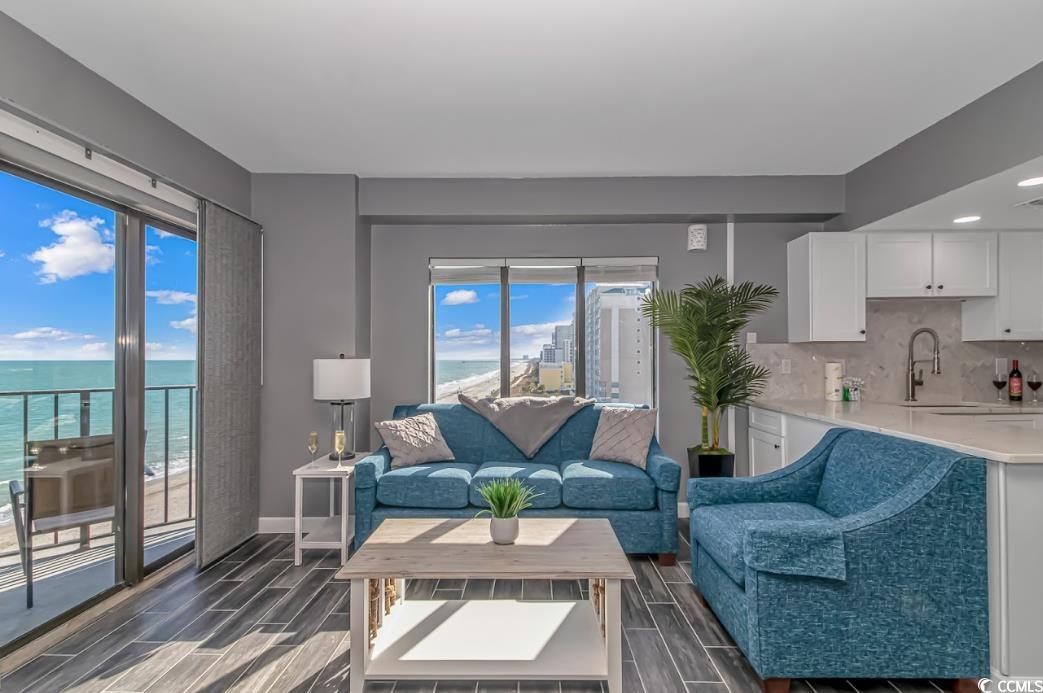 1605 South Ocean Boulevard, Unit 603 Myrtle Beach, SC 29577 - Photo 8 of 40 Living room with a water view and wood tiled floors