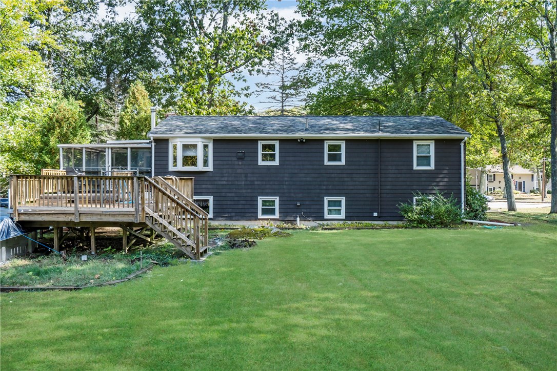 6 Hornbeam Road Coventry, RI 02816 - Photo 16 of 23 A rear perspective of the house. The pool might be closed for the season but it is a perfect spot for entertaining.