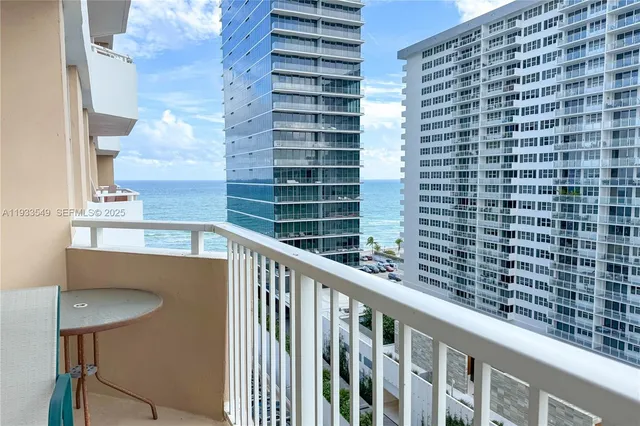 a view of a balcony with chair