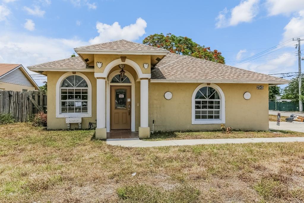 2545 Hypoluxo Road Lake Worth, FL 33462 - Photo 1 of 18 Front