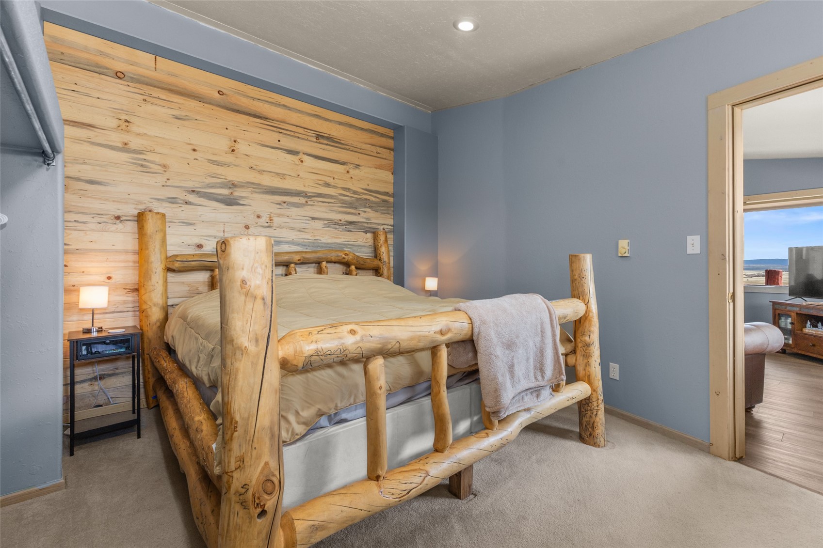 151 Jcr 26 Walden, CO 80430 - Photo 12 of 28 a bed sitting in a bedroom next to a window