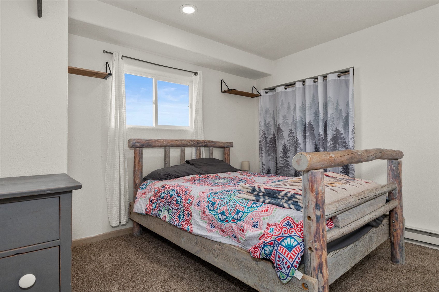 151 Jcr 26 Walden, CO 80430 - Photo 18 of 28 a bedroom with a bed and a window