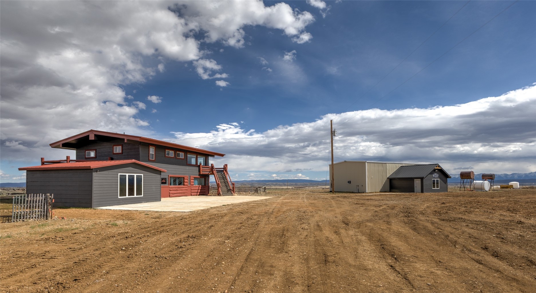 151 Jcr 26 Walden, CO 80430 - Photo 23 of 28 a front view of a house with a yard