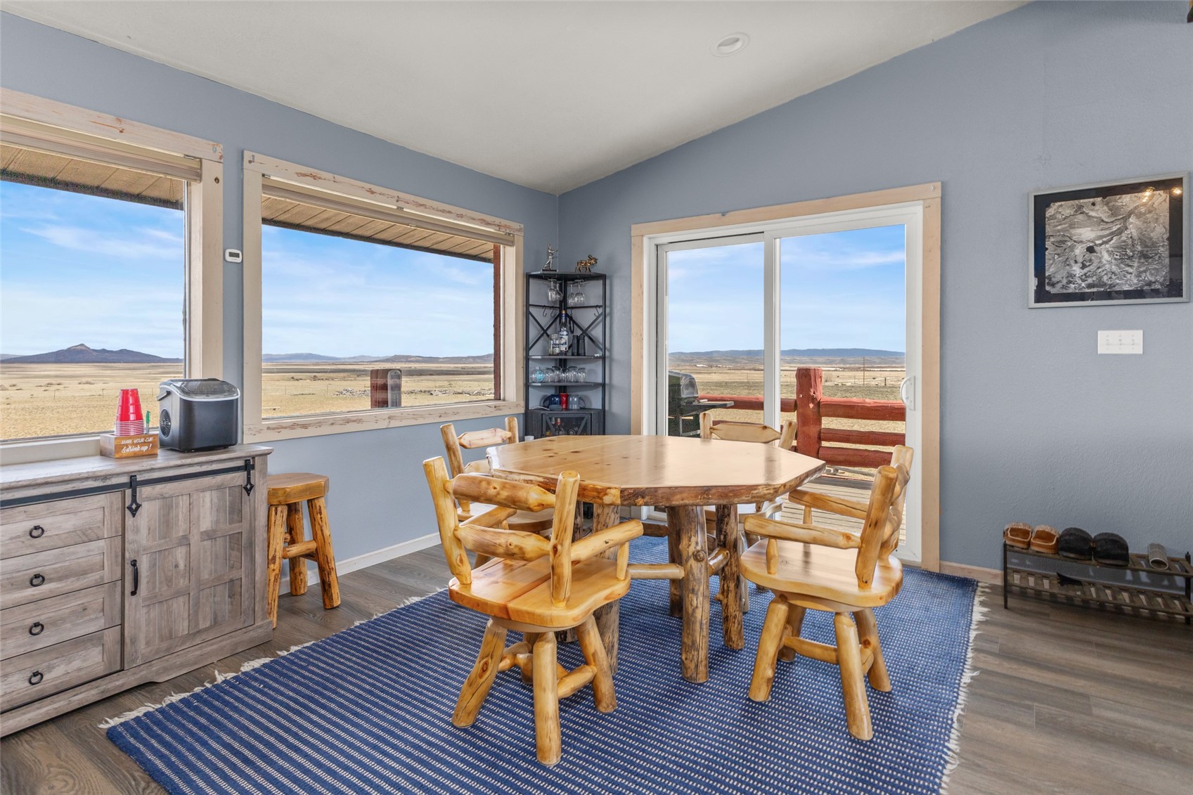 151 Jcr 26 Walden, CO 80430 - Photo 8 of 28 a view of a dining room with furniture window and wooden floor