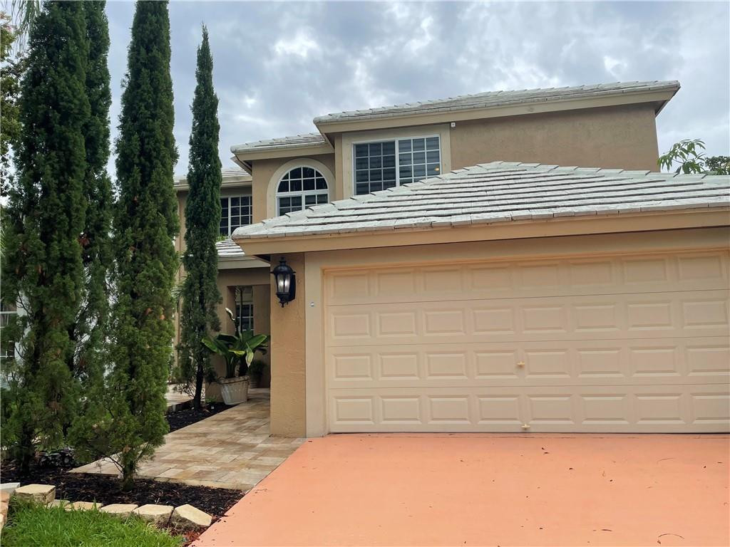 22909 Old Inlet Bridge Drive Boca Raton, FL 33433 - Photo 8 of 9 a house view with a outdoor space