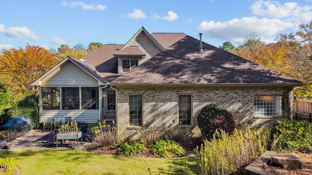 a view of a dining room with furniture and window