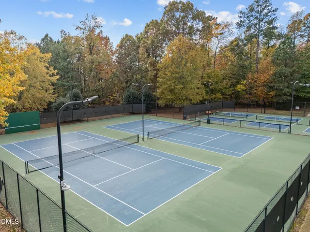 a kitchen with stainless steel appliances granite countertop a sink dishwasher stove and cabinets