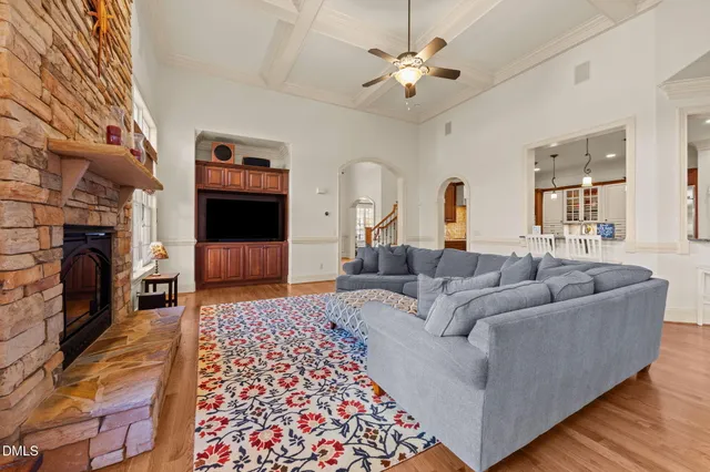 a bedroom with a bed and a television