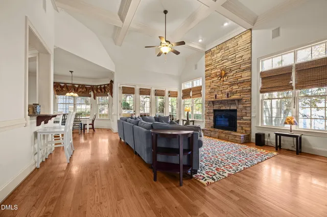 a white toilet sitting next to a shower