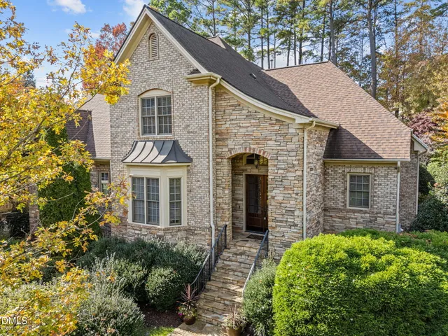 a bedroom with a balcony a bed and a couch