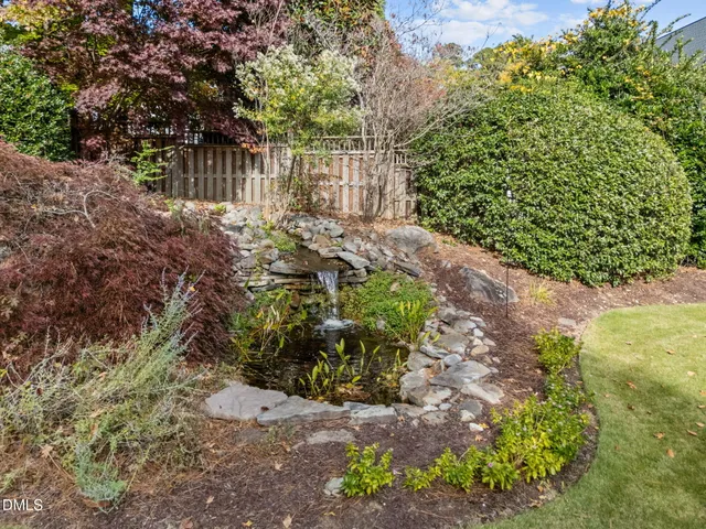 a view of backyard with green space