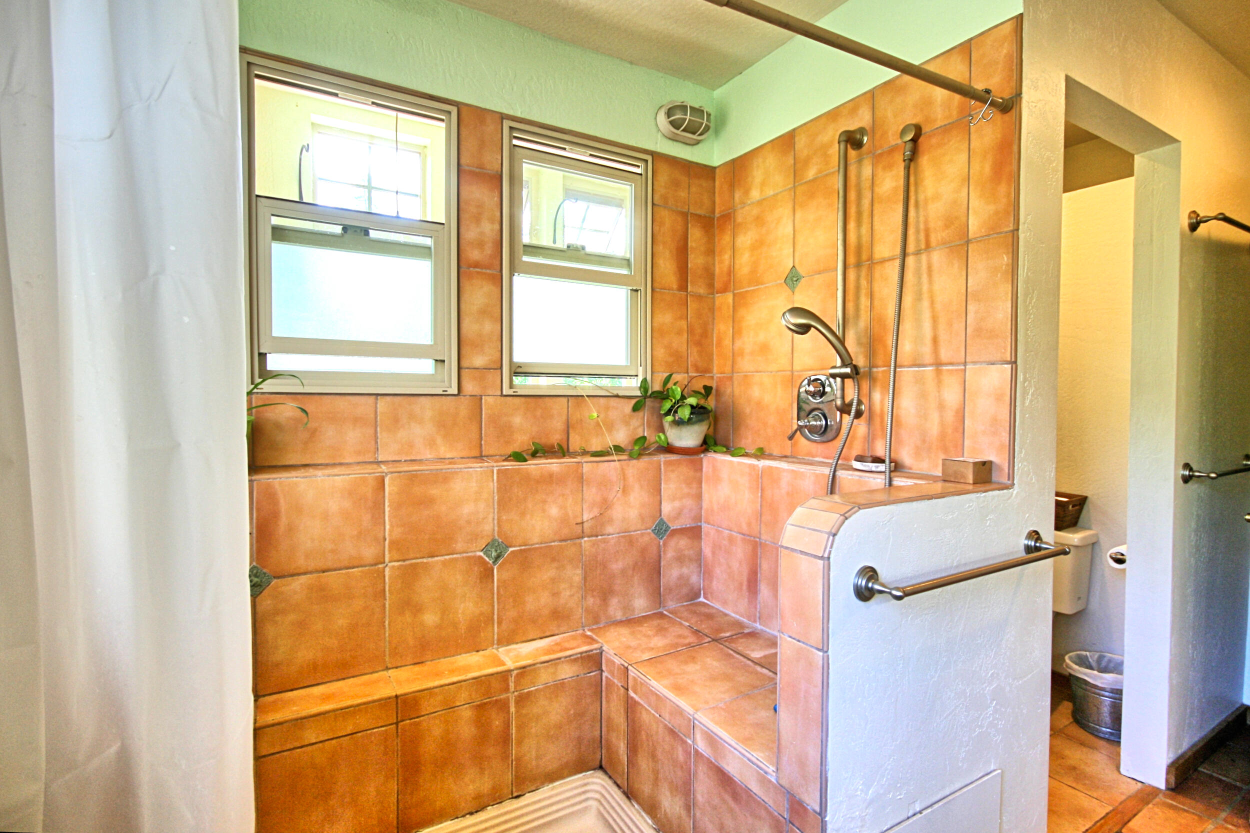 8150 Upper Applegate Road Jacksonville, OR 97530 - Photo 36 of 122 a bathroom with a bathtub and next to a window