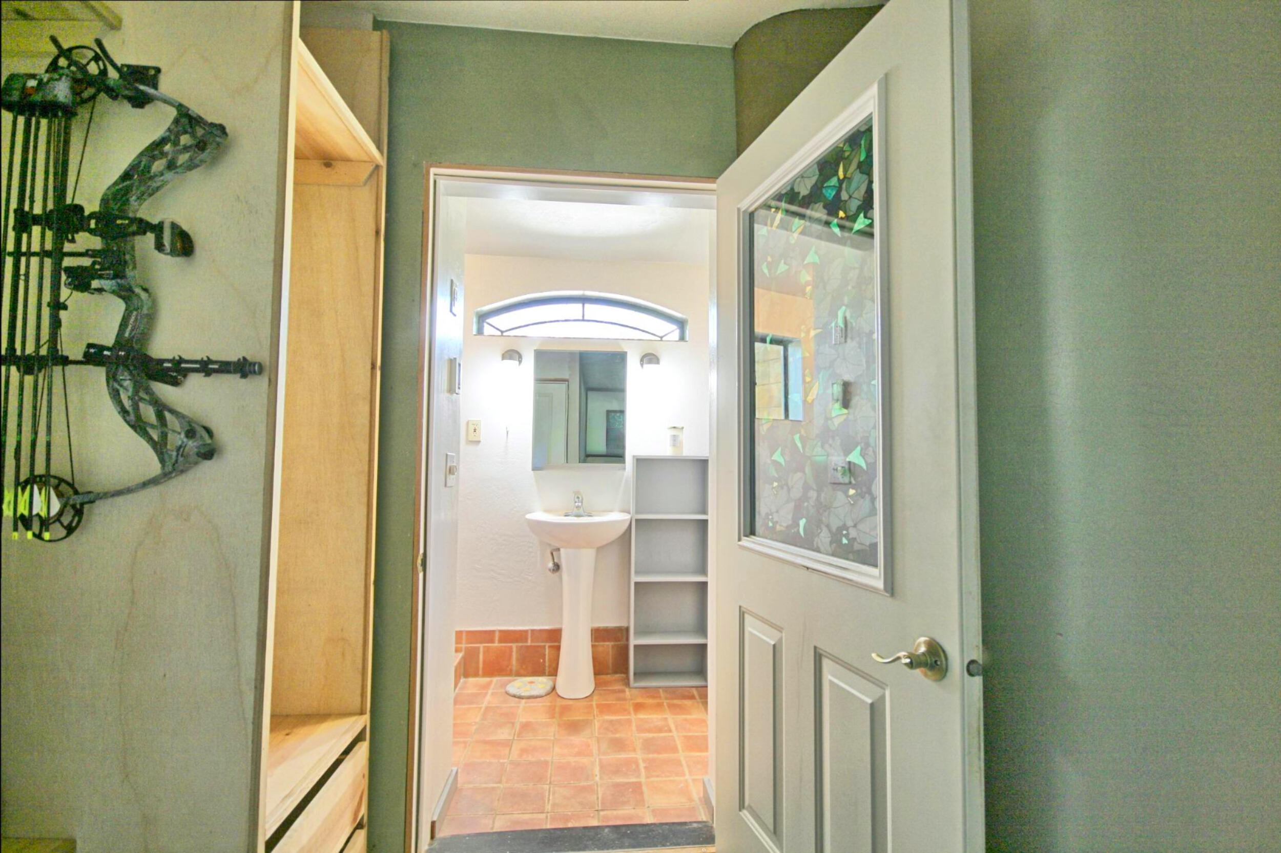 8150 Upper Applegate Road Jacksonville, OR 97530 - Photo 50 of 122 a bathroom with a glass shower door and mirror