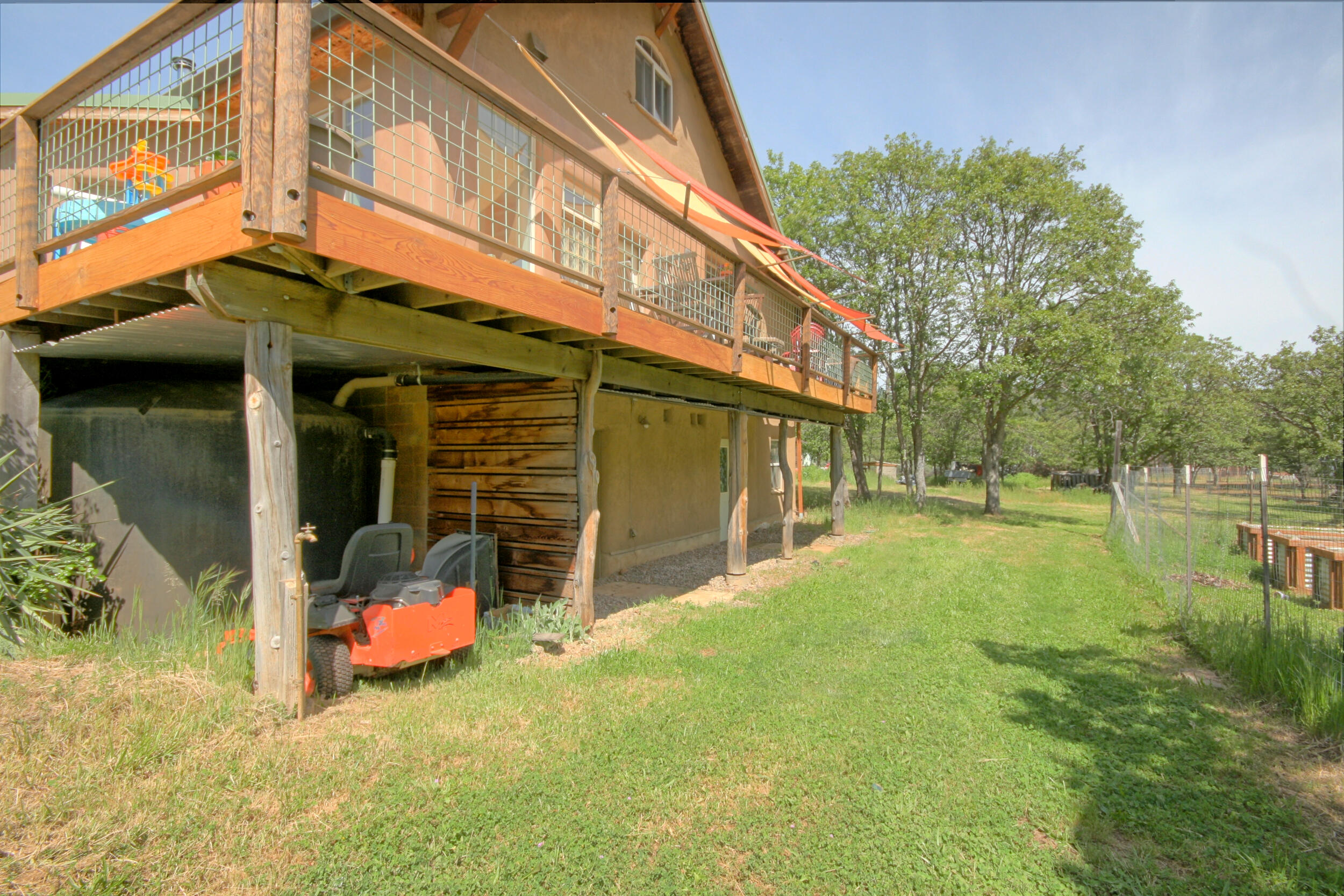 8150 Upper Applegate Road Jacksonville, OR 97530 - Photo 63 of 122 a view of a house with backyard and sitting area