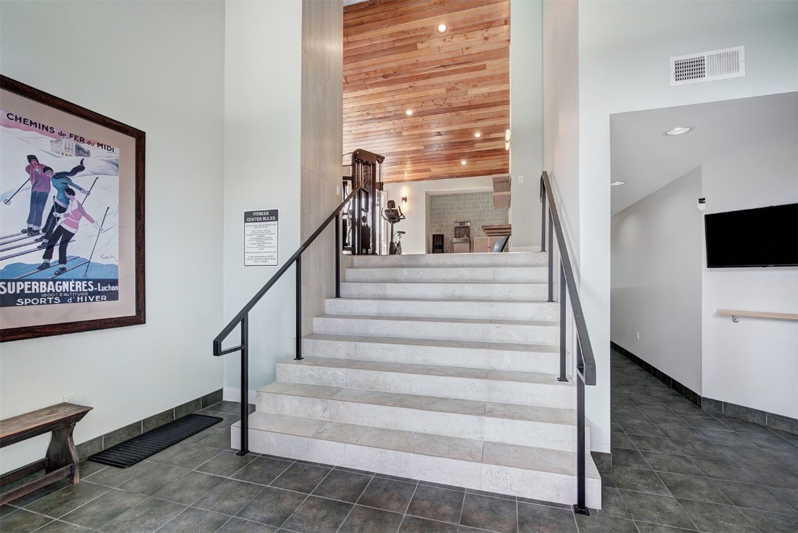 120 La Bonte Street, Unit 202 Dillon, CO 80435 - Photo 19 of 29 a view of staircase with white walls and a window