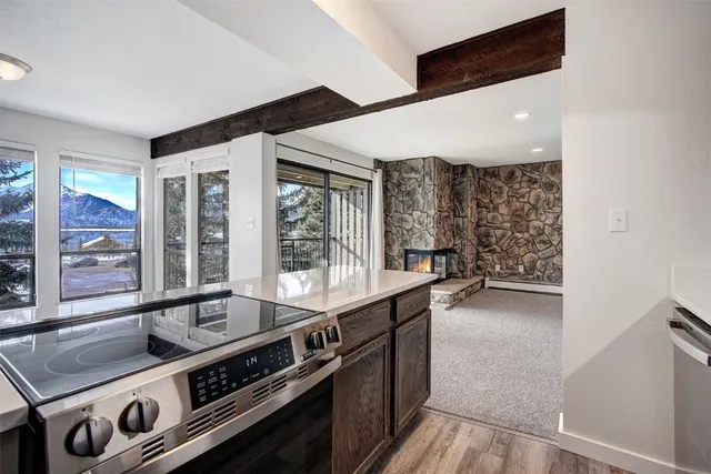 a kitchen with a stove and a sink