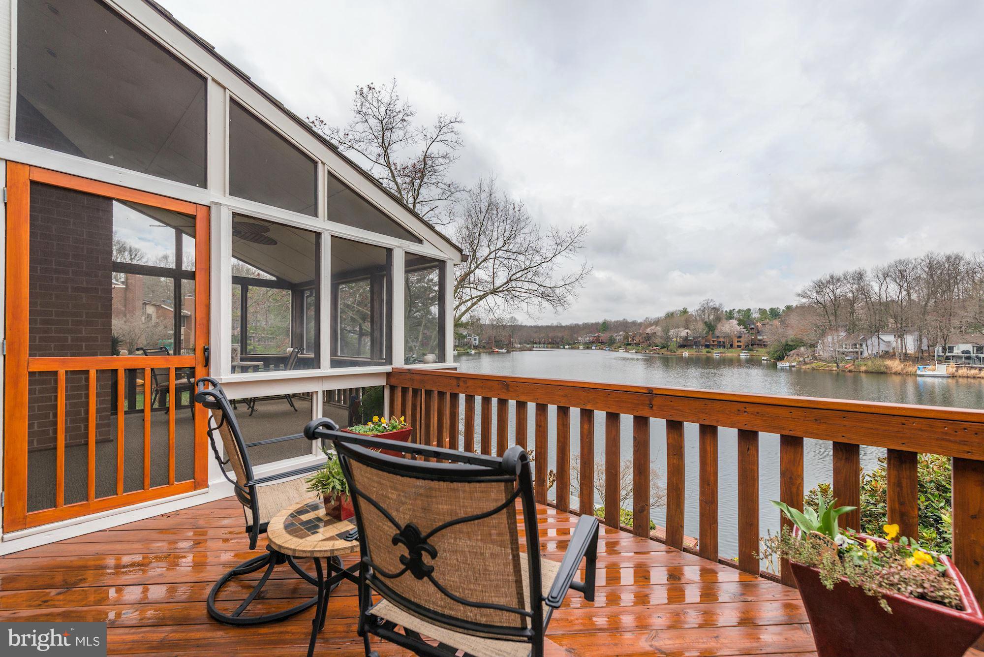 11076 Thrush Ridge Road Reston, VA 20191 - Photo 2 of 29 a view of a chairs and table in the balcony