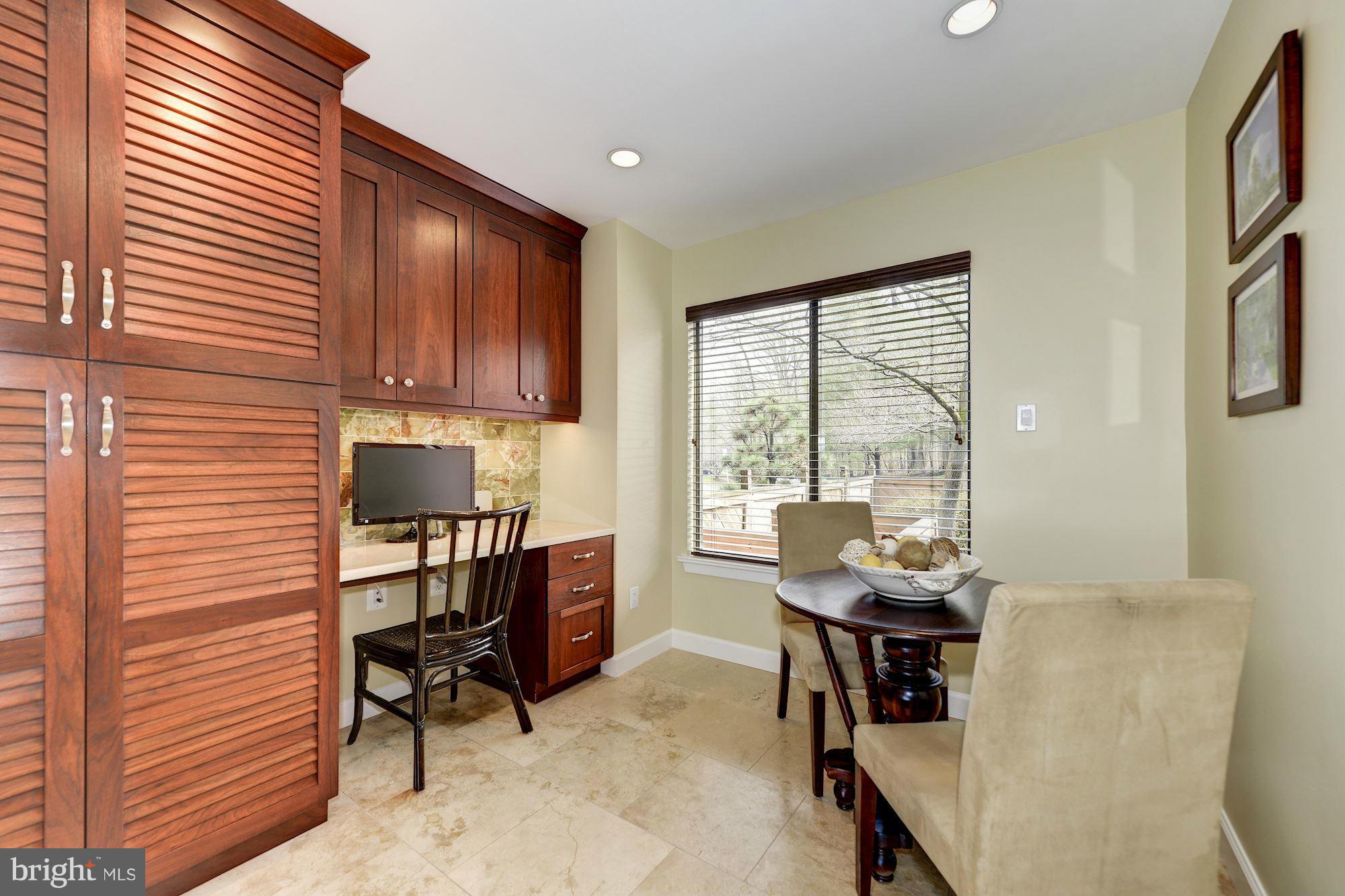 11076 Thrush Ridge Road Reston, VA 20191 - Photo 11 of 29 a workspace with furniture and a window
