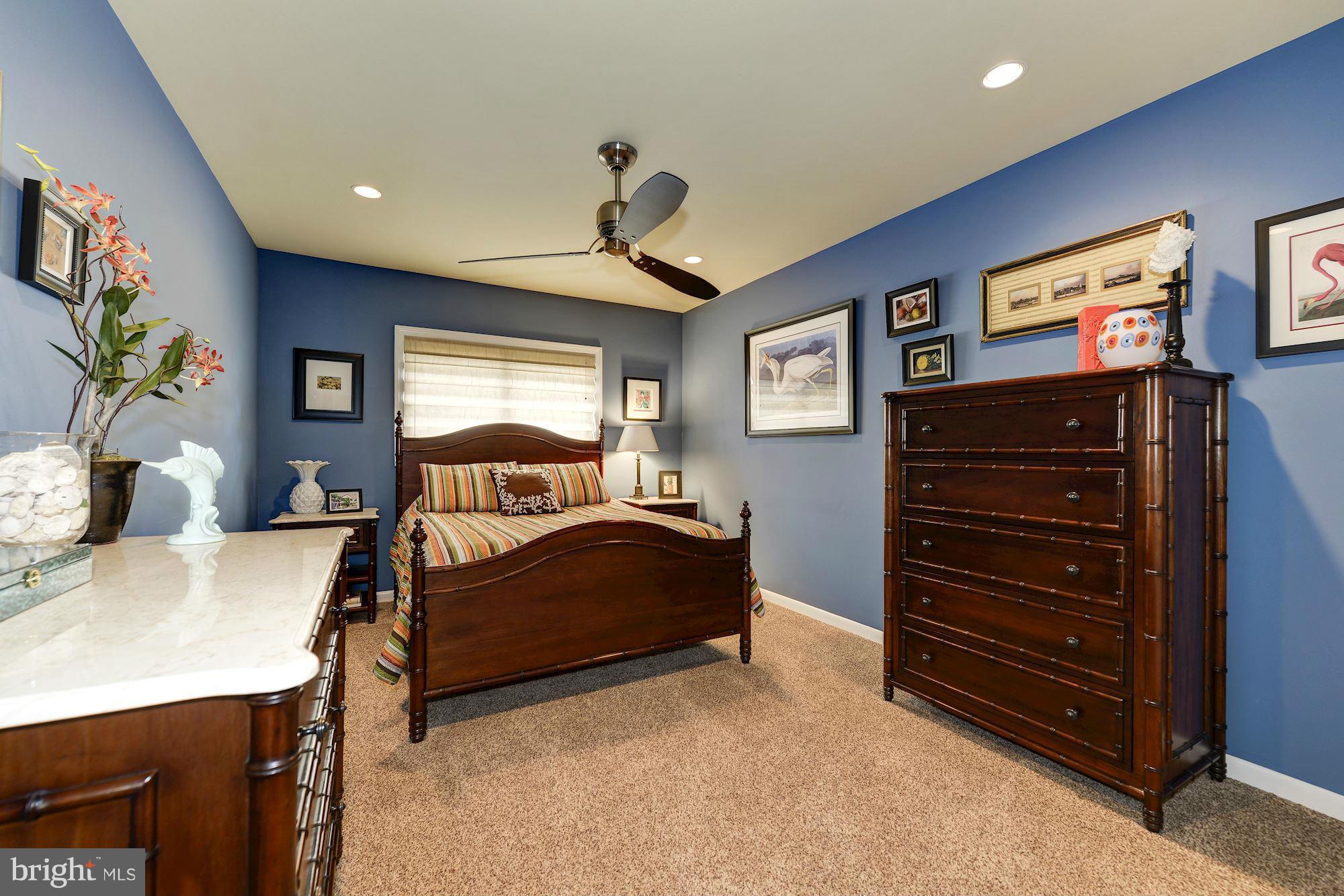 11076 Thrush Ridge Road Reston, VA 20191 - Photo 15 of 29 a living room with furniture and a flat screen tv