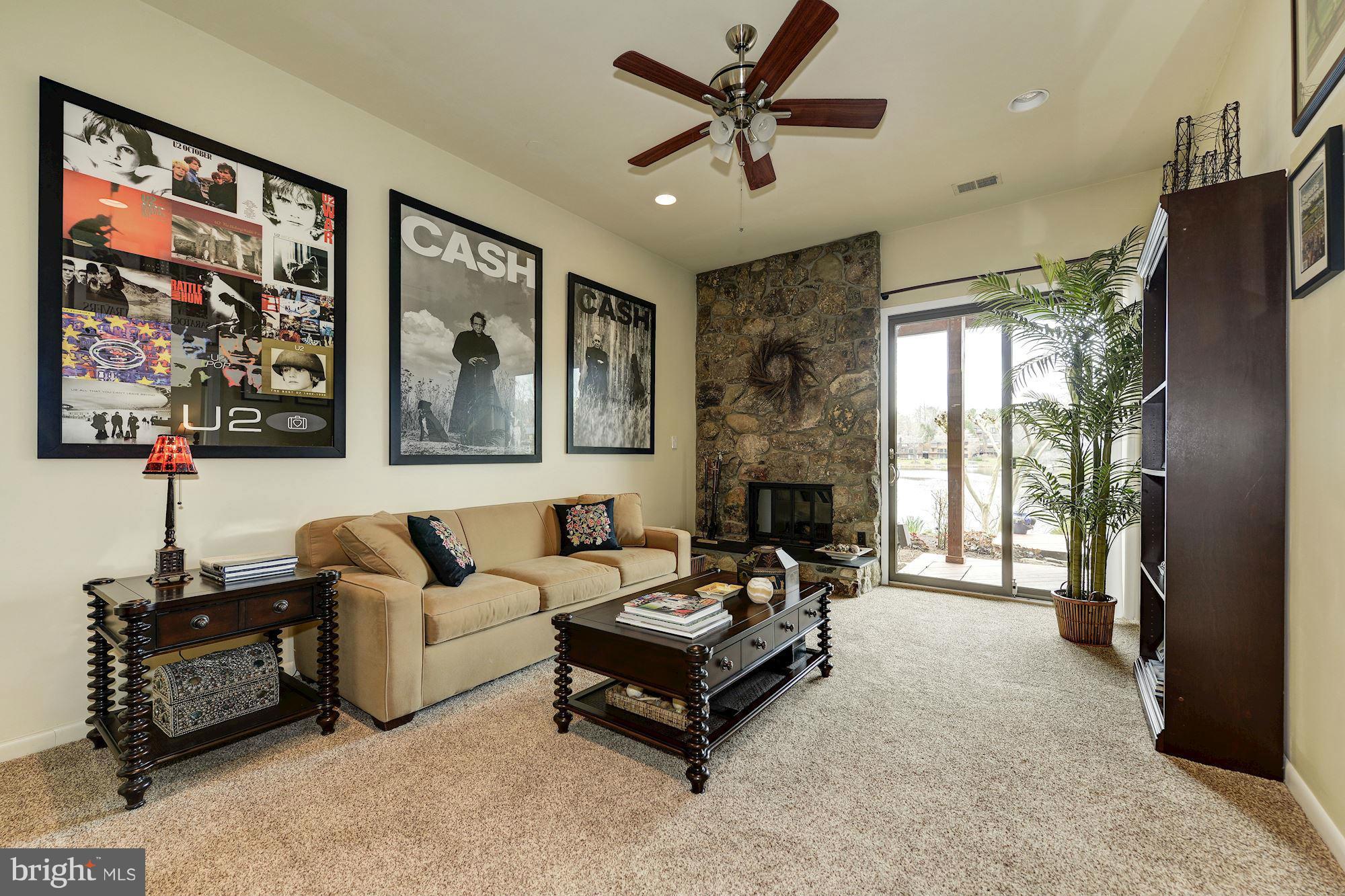 11076 Thrush Ridge Road Reston, VA 20191 - Photo 19 of 29 a living room with furniture and a large window