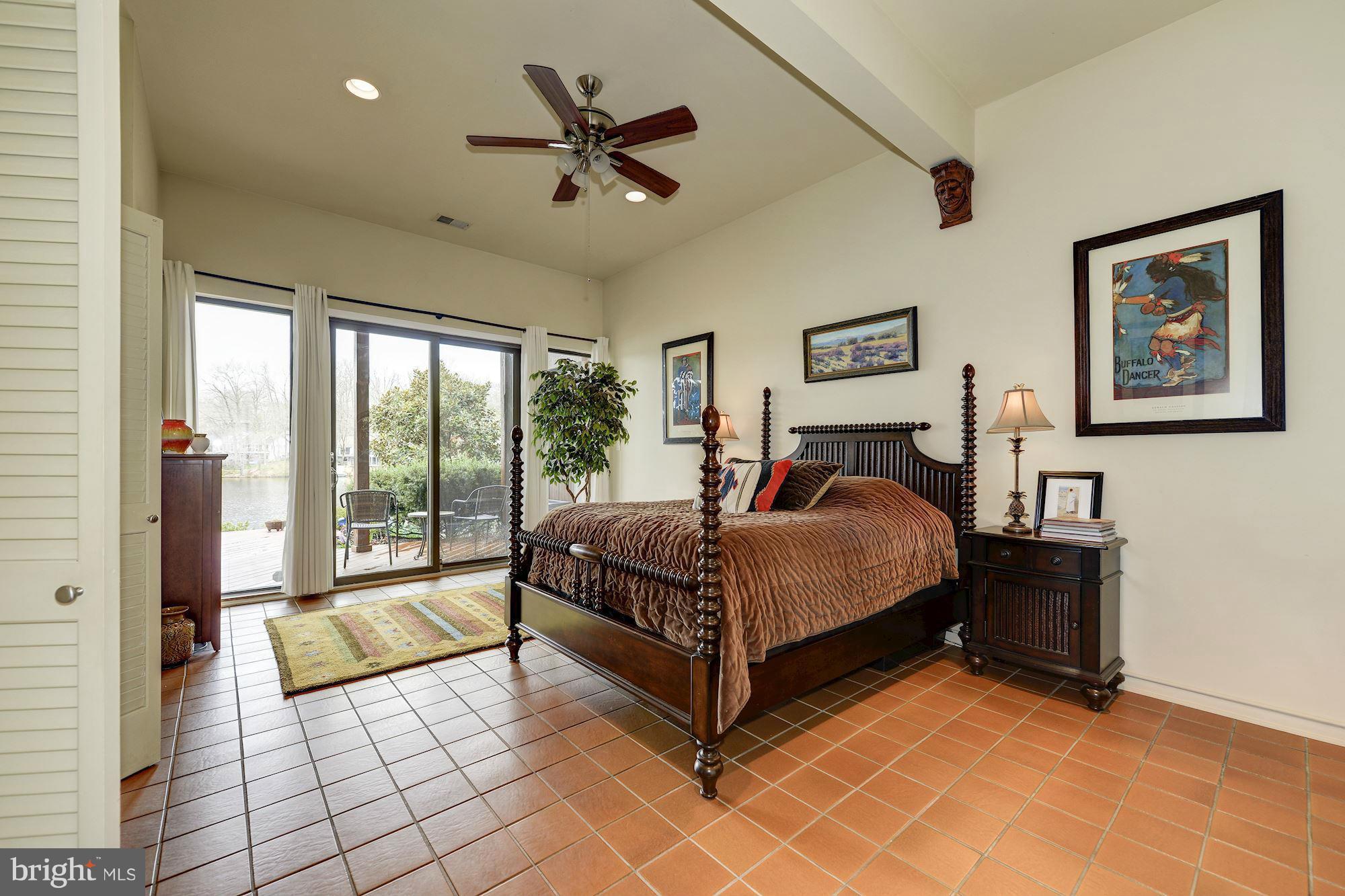 11076 Thrush Ridge Road Reston, VA 20191 - Photo 20 of 29 a bedroom with a large bed and a view of bedroom