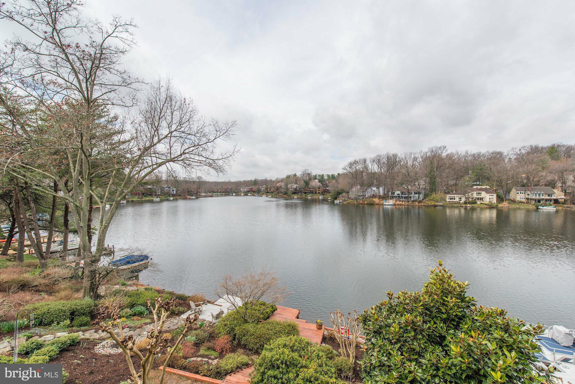 11076 Thrush Ridge Road Reston, VA 20191 - Photo 26 of 29 a body of water with a tree in the background