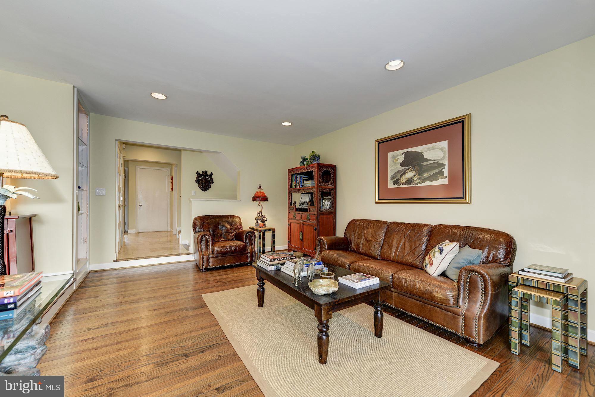 11076 Thrush Ridge Road Reston, VA 20191 - Photo 6 of 29 a living room with furniture and a wooden floor
