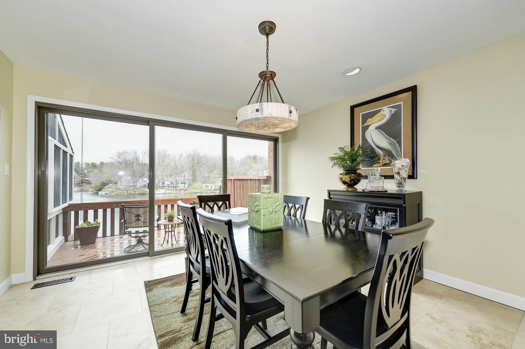 11076 Thrush Ridge Road Reston, VA 20191 - Photo 7 of 29 a view of a dining room with furniture window and outside view