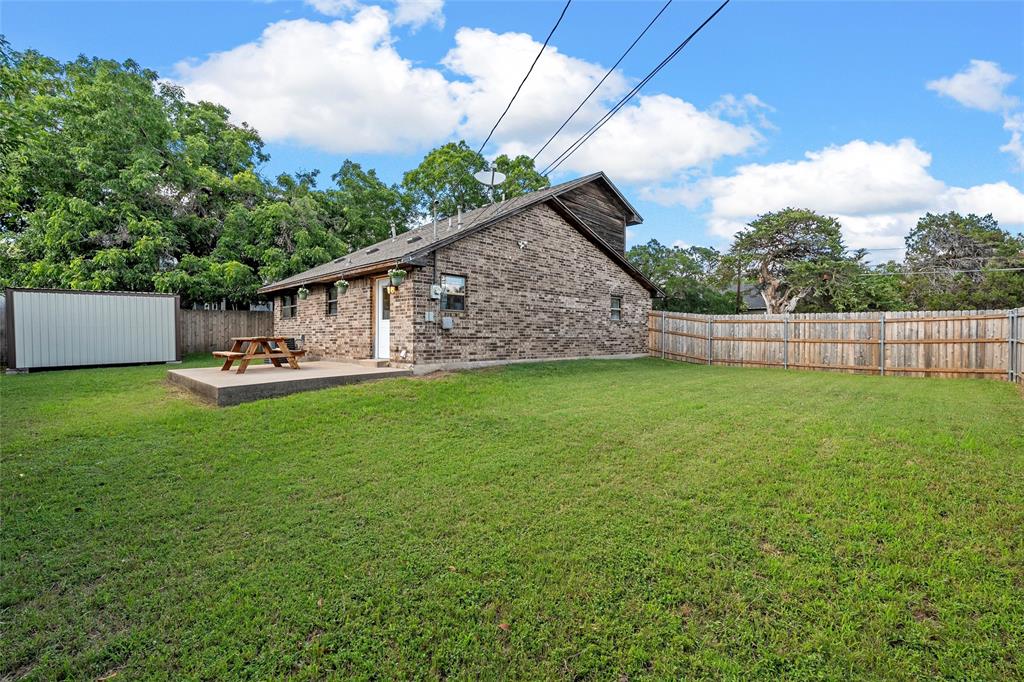 3000 North 15th A Street Waco, TX 76708 - Photo 23 of 24 a view of a house with a yard and sitting area