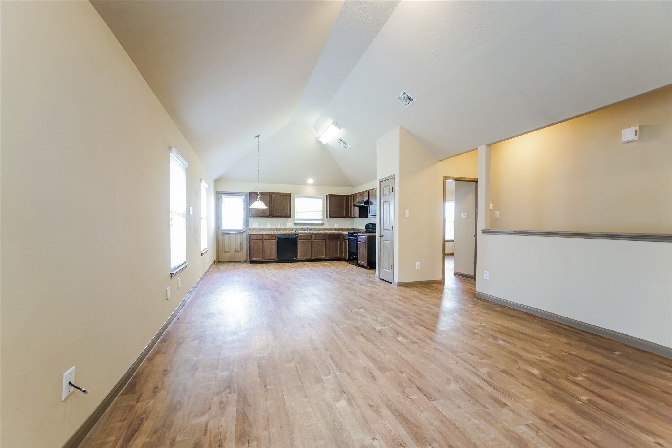 21811 South Werrington Way Houston, TX 77073 - Photo 3 of 13 a view of kitchen with wooden floor