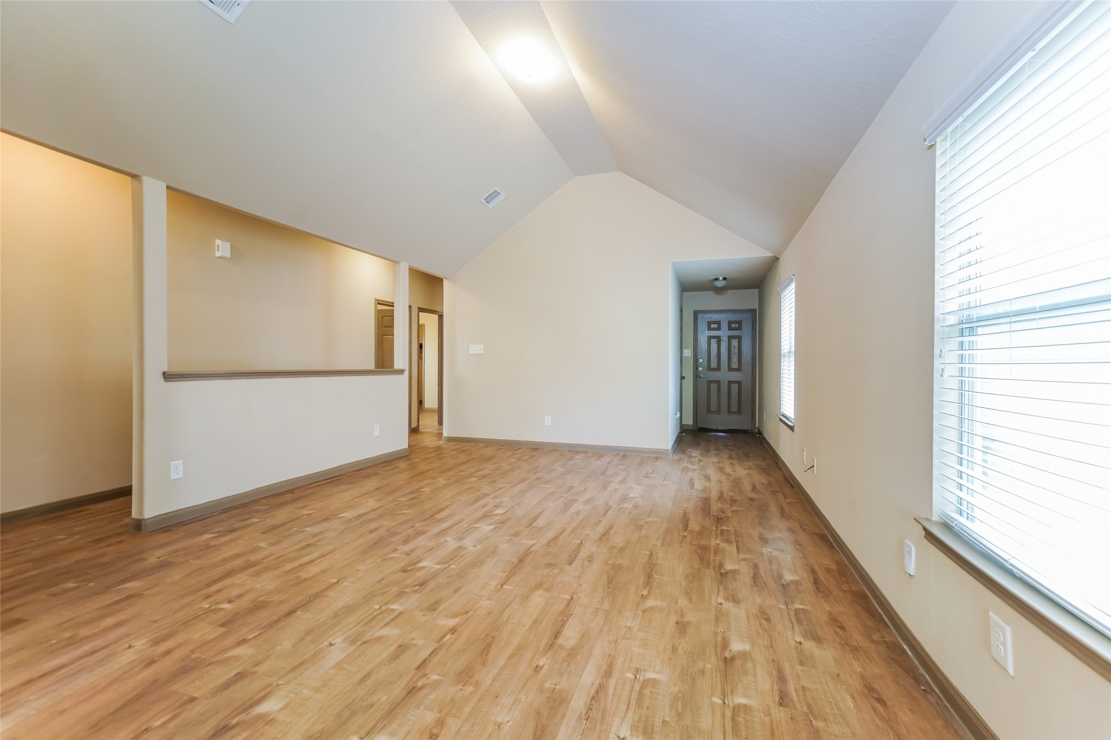 21811 South Werrington Way Houston, TX 77073 - Photo 4 of 13 a view of empty room with wooden floor
