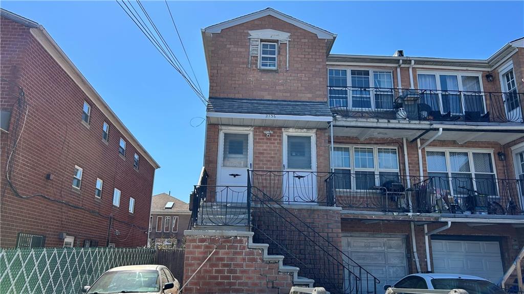 2136 East 69th Street Brooklyn, NY 11234 - Photo 1 of 10 a front view of a house with glass windows