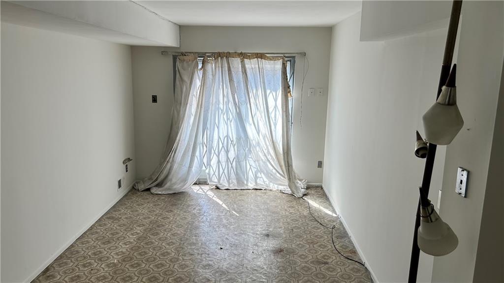 2136 East 69th Street Brooklyn, NY 11234 - Photo 10 of 10 wooden floor in an empty room