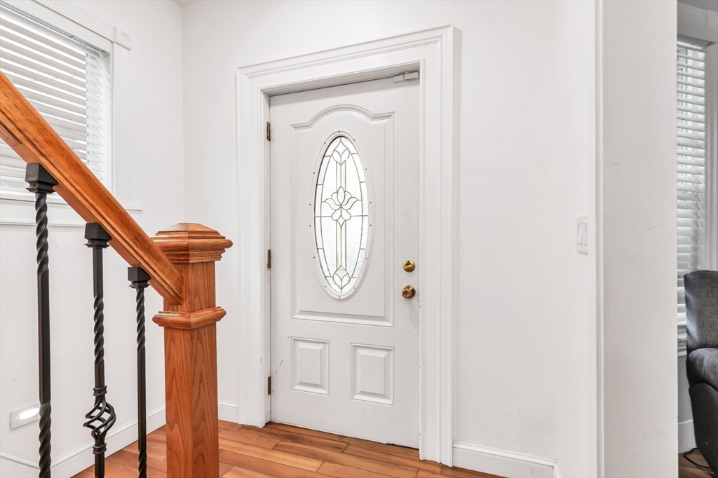 42 D Street Lowell, MA 01851 - Photo 6 of 27 a view of front door with wooden floor