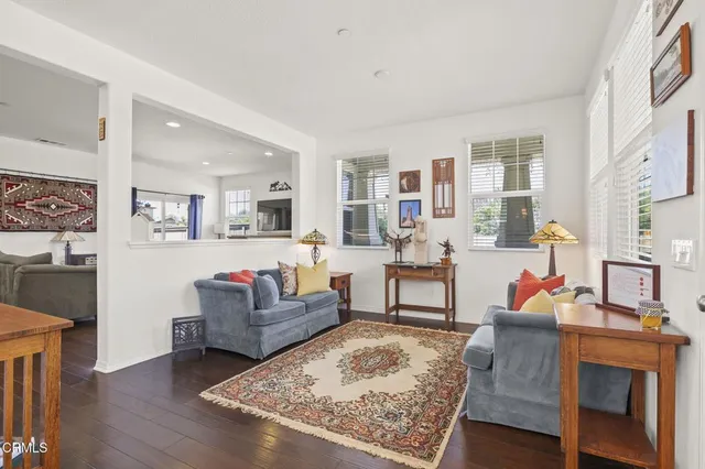 a living room with furniture and a couch