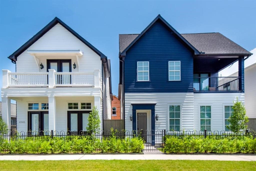 642 Delmar Street Houston, TX 77023 - Photo 3 of 23 a front view of a house with a yard and potted plants