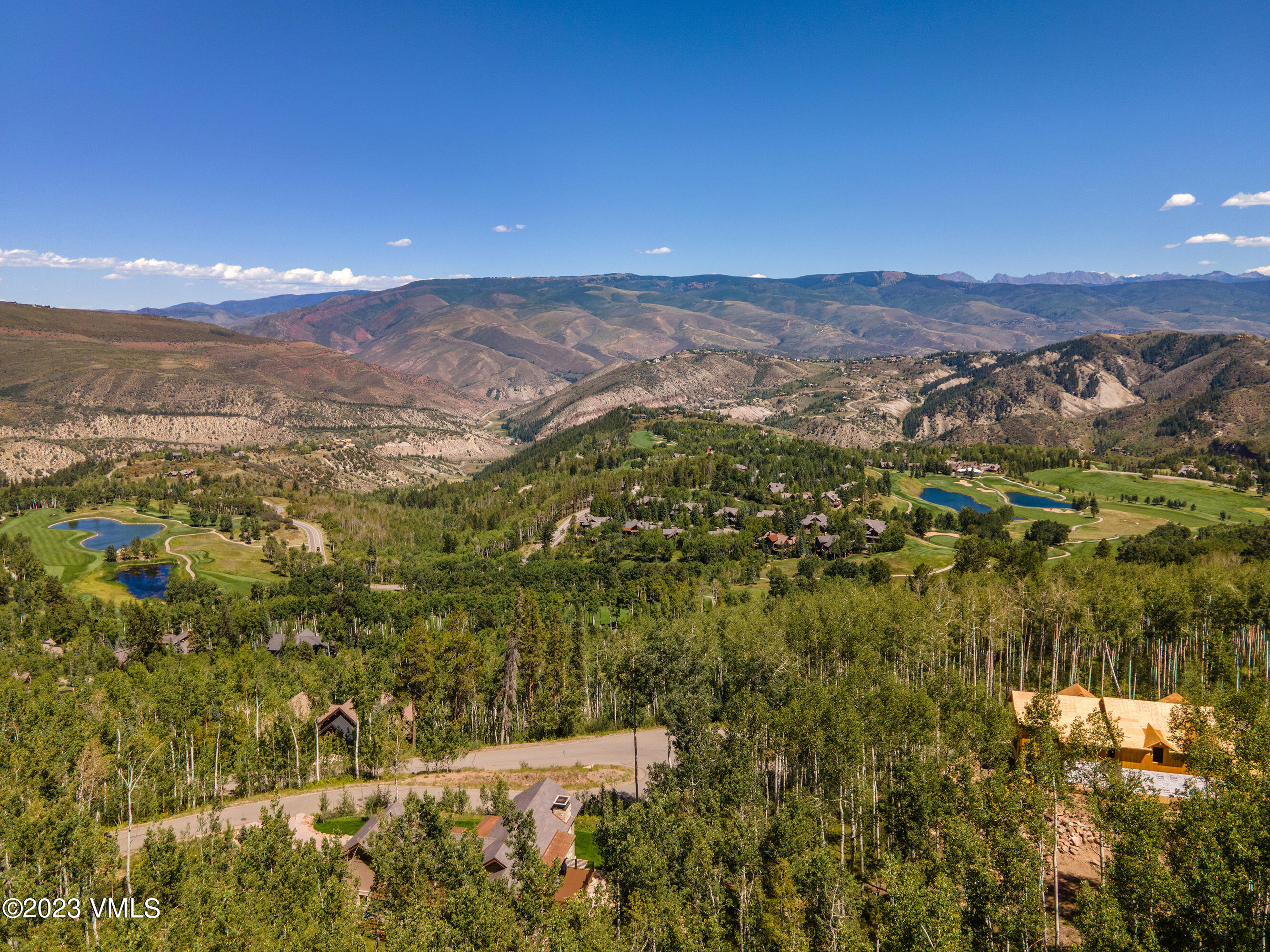 1121 Forest Trail Edwards, CO 81632 - Photo 13 of 13 a view of a city with mountains in the background