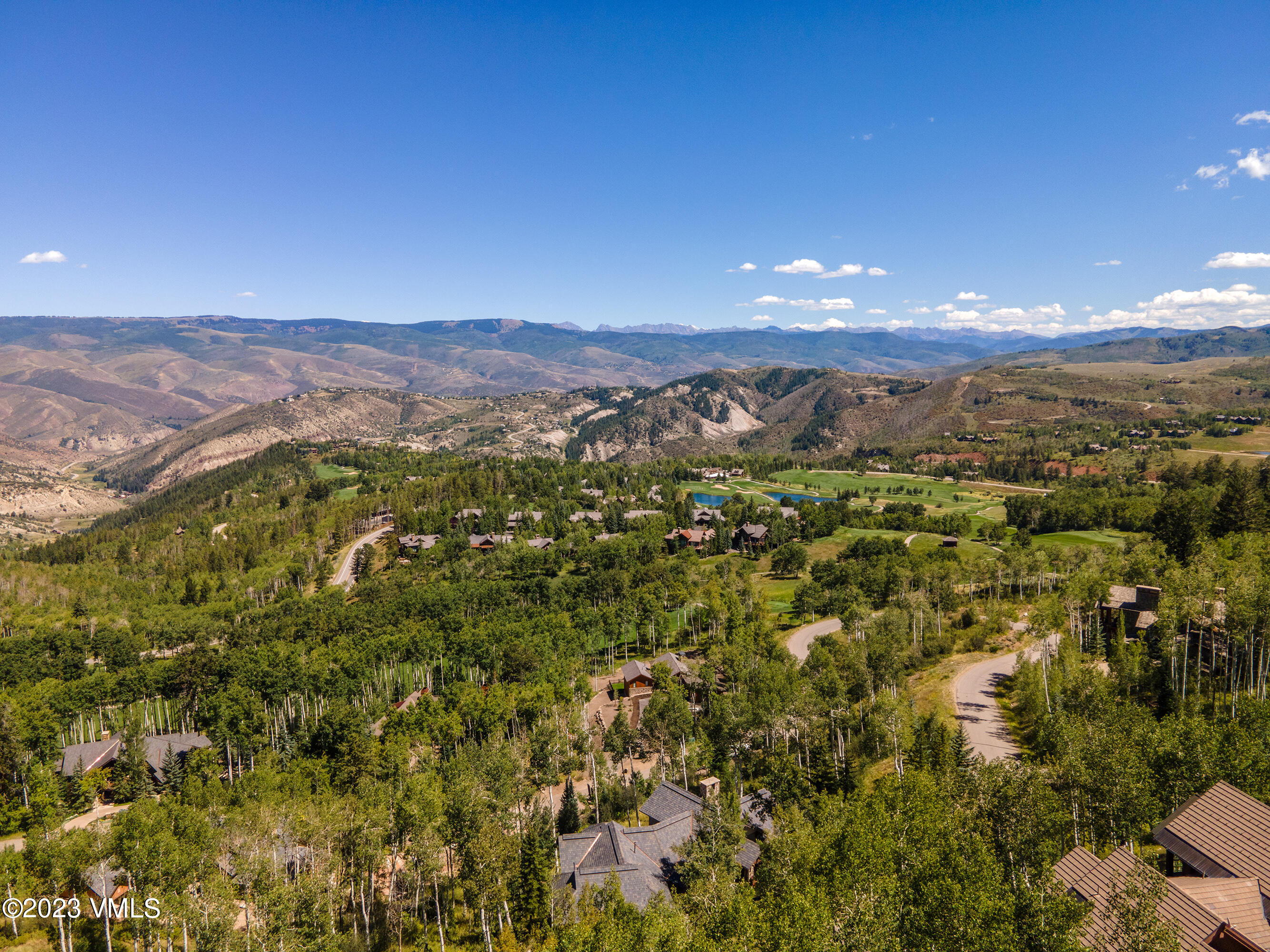 1121 Forest Trail Edwards, CO 81632 - Photo 8 of 13 a view of a city with mountains in the background
