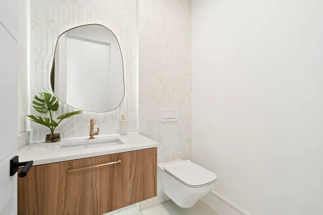 a utility room with sink dryer and washer