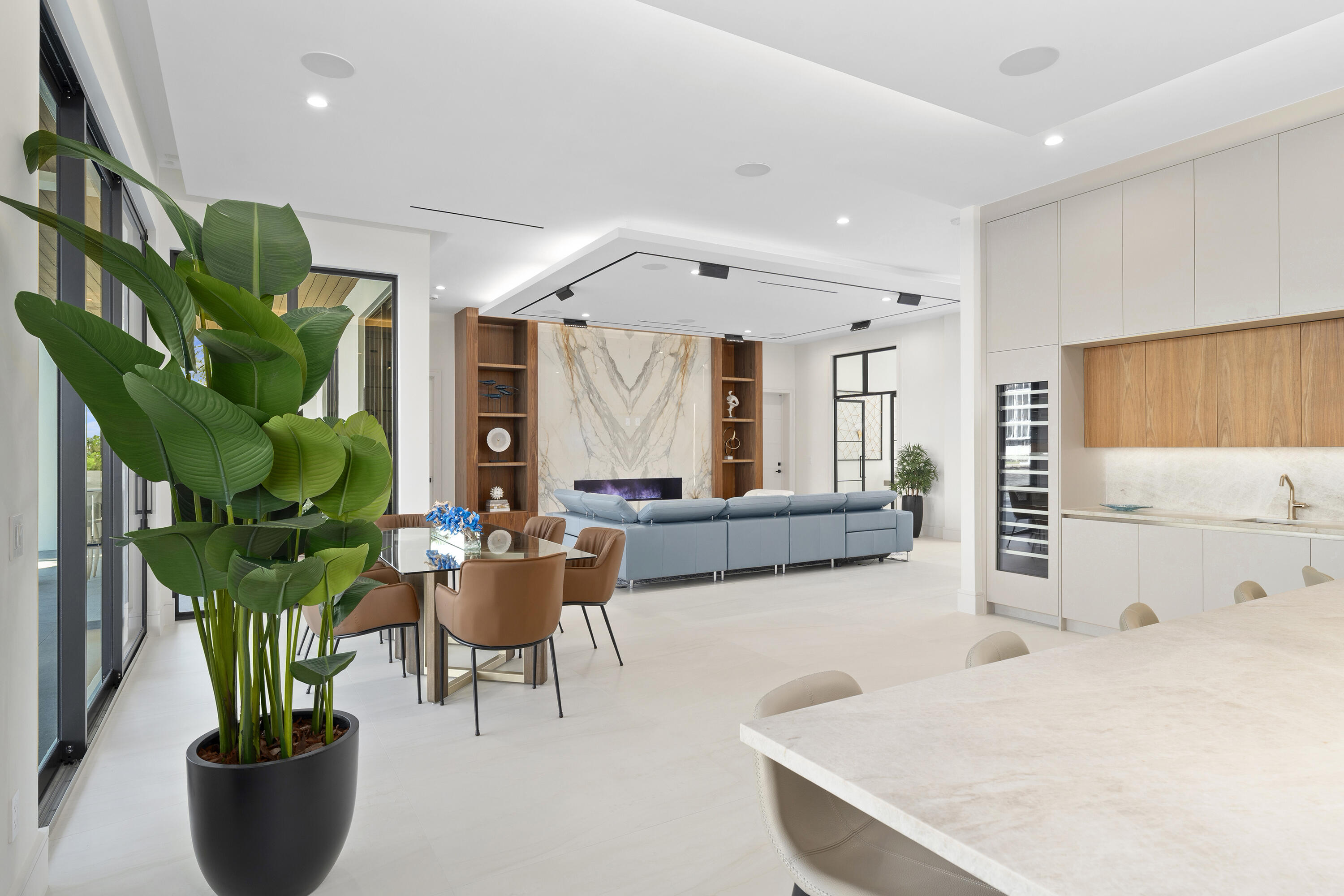 2880 Northeast 9th Street Pompano Beach, FL 33062 - Photo 31 of 61 a living room with furniture a potted plant and a large window