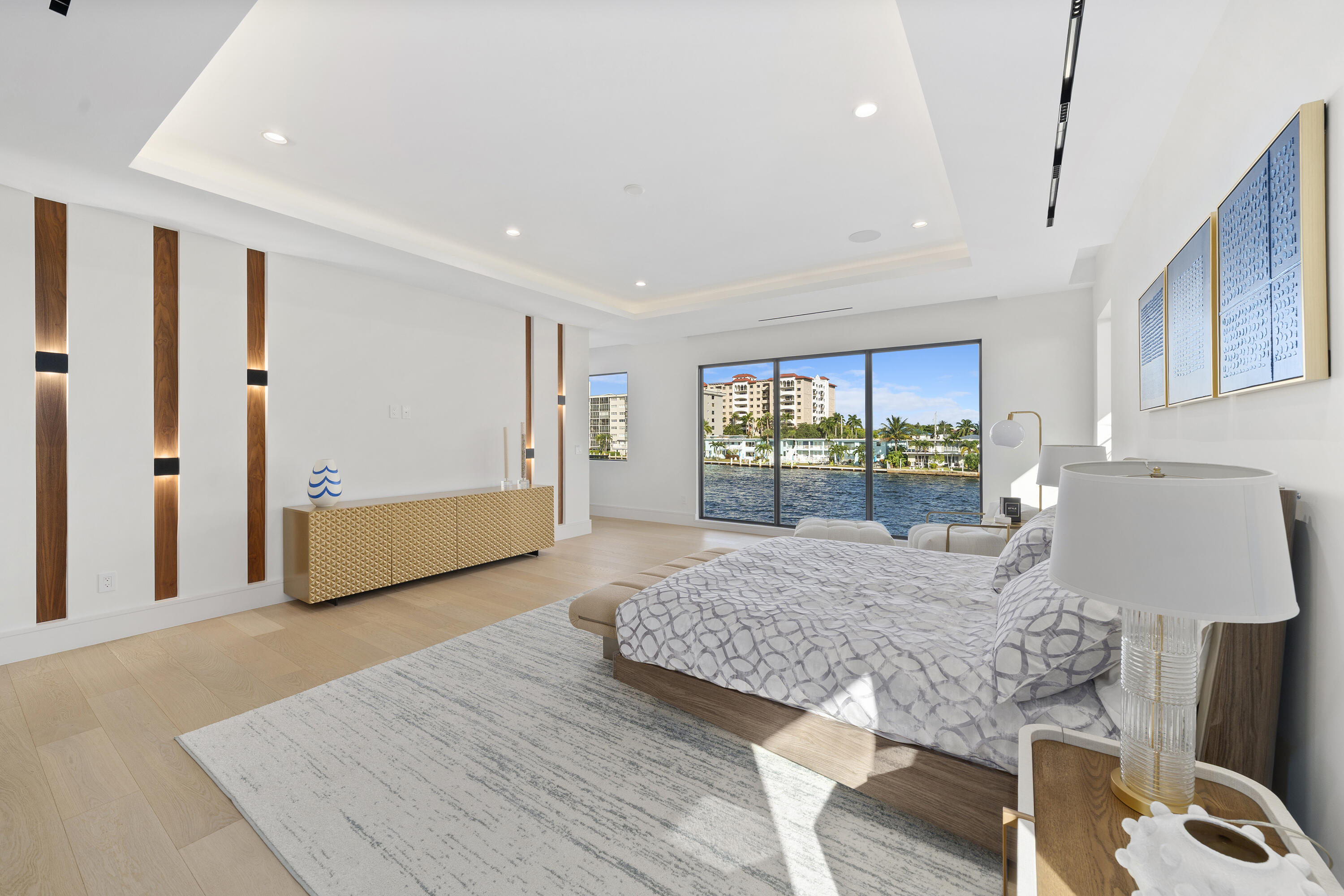 2880 Northeast 9th Street Pompano Beach, FL 33062 - Photo 48 of 61 a spacious bedroom with a large bed and a window