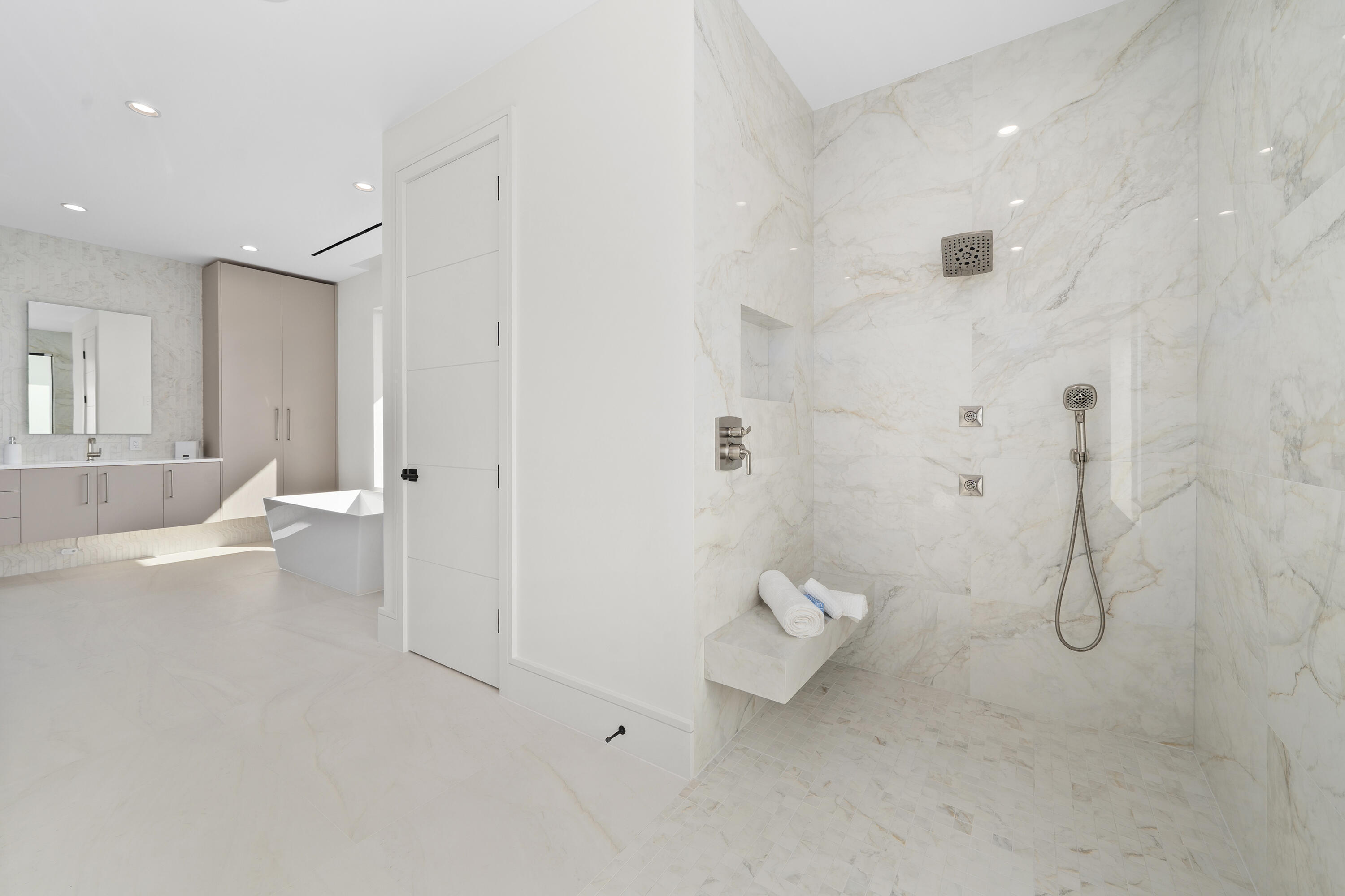 2880 Northeast 9th Street Pompano Beach, FL 33062 - Photo 52 of 61 a bathroom with a sink a toilet and shower