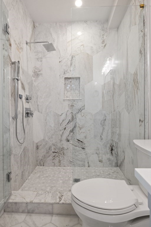 21 Alpha Road, Unit 1 Boston, MA 02124 - Photo 14 of 24 a bathroom with a toilet and a shower