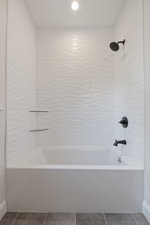 21 Alpha Road, Unit 1 Boston, MA 02124 - Photo 20 of 24 a bathroom with a bathtub