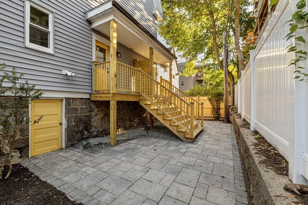 21 Alpha Road, Unit 1 Boston, MA 02124 - Photo 24 of 24 a view of a pathway with a house