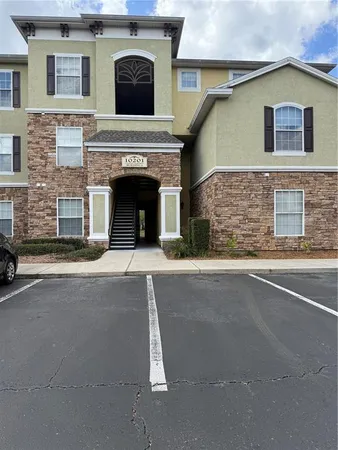 a front view of a house with a garage